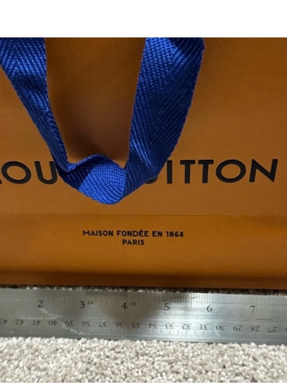 Louis Vuitton Orange Shopping Bag with Blue Handles and Black Logo